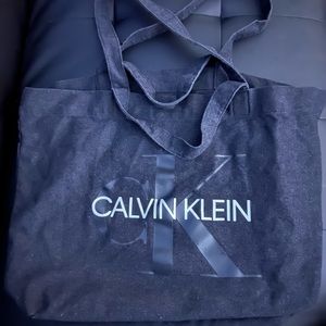 Calvin Klein bag has two straps short and long ones.